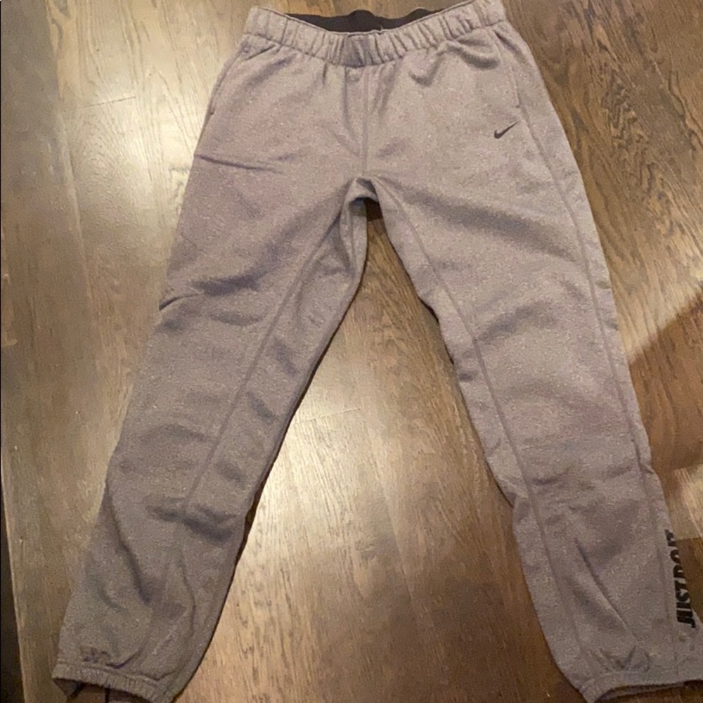 Grey Nike sweatpants